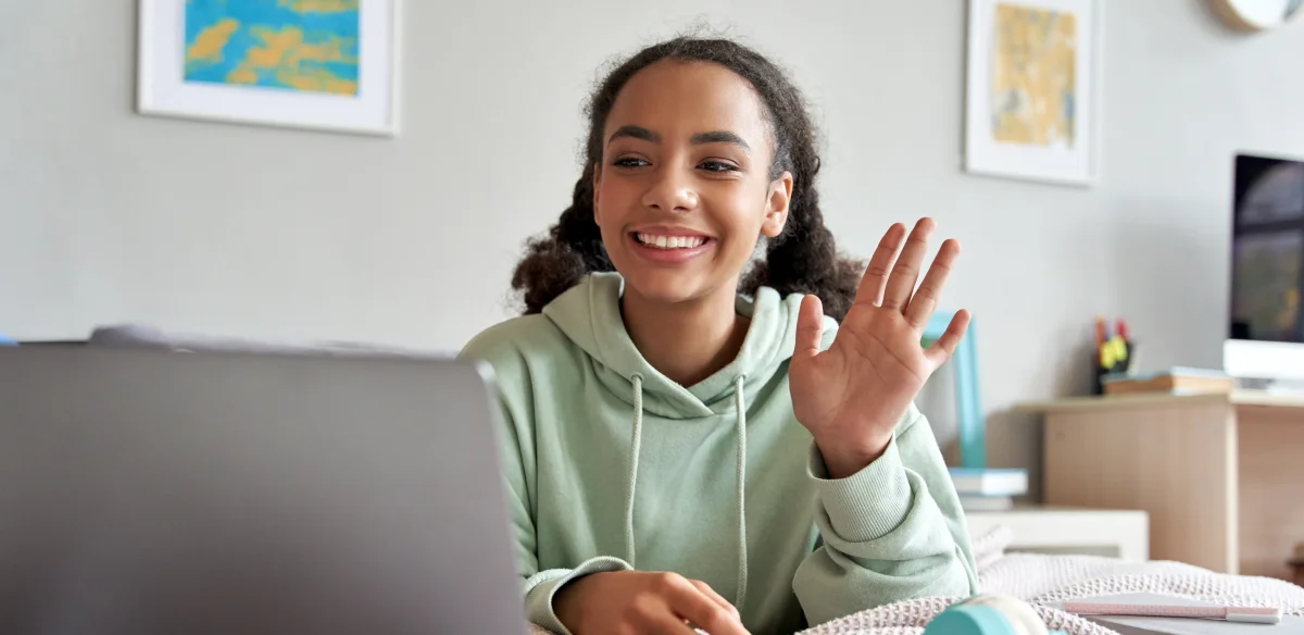 High school student wearing a light green hoodie