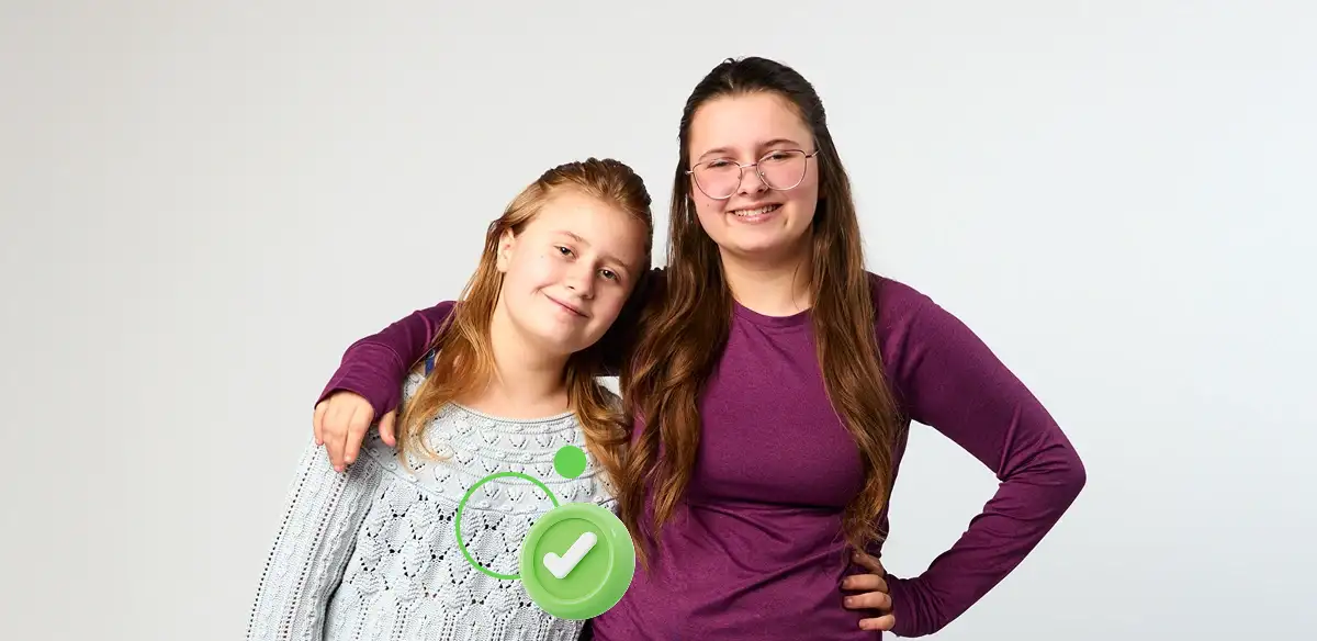 Two girls hugging